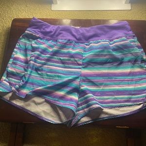 Purple, Blue, and white colored shorts.